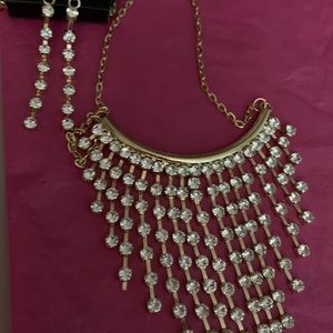 Long gold and rhinestone necklace